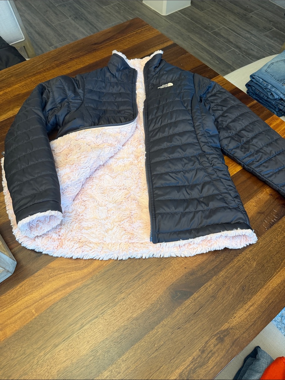 The North Face Reversible Kids Puffer Jacket in Black and Light Pink